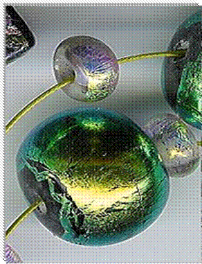 http://upload.wikimedia.org/wikipedia/commons/thumb/5/5d/Dichroicclose.jpg/180px-Dichroicclose.jpg