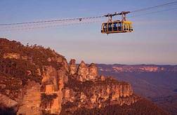 The Skyway glides past the most famous icon in the Mountains - the Three Sisters