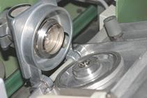 http://upload.wikimedia.org/wikipedia/commons/thumb/8/81/Rotorspinnstelle.jpg/250px-Rotorspinnstelle.jpg