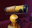 http://upload.wikimedia.org/wikipedia/commons/thumb/c/cc/NewtonsTelescopeReplica.jpg/220px-NewtonsTelescopeReplica.jpg