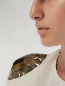 A shoulder pad designed by Ninela Ivanova � complete with mould growing inside the PVC.