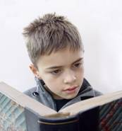 Описание: http://phillips.blogs.com/photos/uncategorized/312youngboyreadingbook.jpg