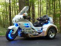 http://www.rsbtravel.com/sites/default/files/transport/honda-goldwing-trike-blue-neon.jpg