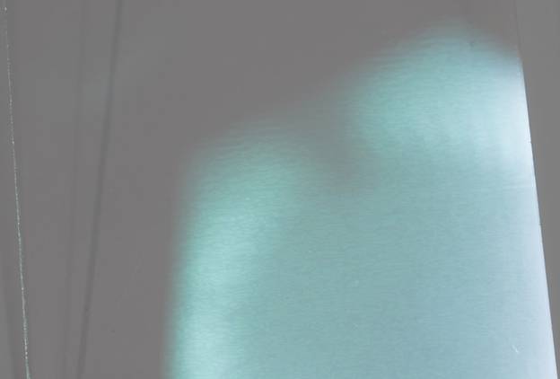 Wavy texture of Museum Glass visible in specular reflection