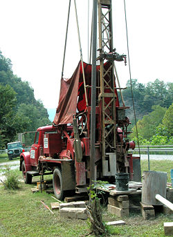 Cable tool water well drilling rig in Kimball, West Virginia. These slow rigs have mostly been replaced by rotary drilling rigs in the U.S.